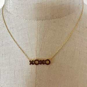 Gold tone XOXO pendant dainty necklace